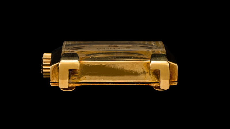 The 18k yellow gold rectangular shaped ref. 2427
